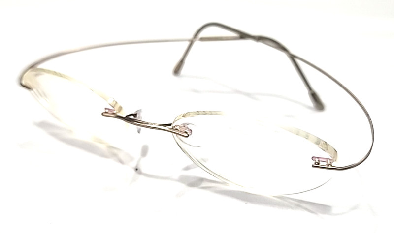 Silhouette 7700 10 6070 Titan Sm Gold Rimless Titanium Eyeglasses 130mm Austria