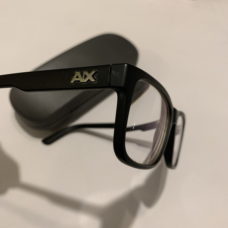 Armani Exchange AX3016 eyeglasses feature a refined square