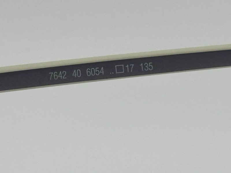 Silhouette 7642 40 6054 Rimless Black Plastic Eyeglasses Frames 40mm 17mm 135mm gallery