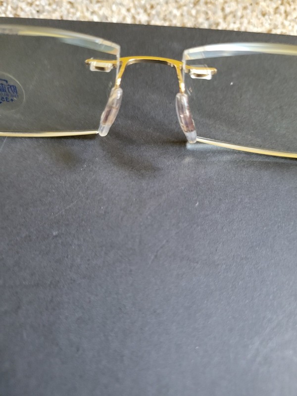 Rimless Rectangular Gold Metal Eyeglass Frames Unisex Adults Solid Pattern gallery