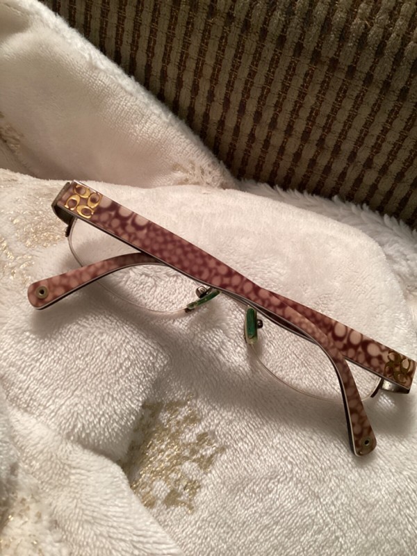 Coach eyeglass Frames, women. Signature pattern. Colors, brown, beige and gold