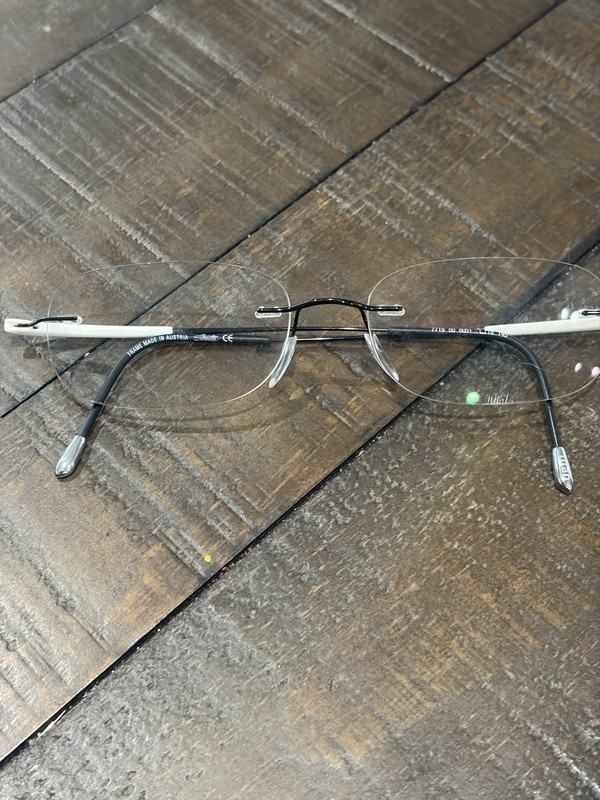 Silhouette 7799 6051 Black Rimless Metal Eyeglasses Frames 50-19 145