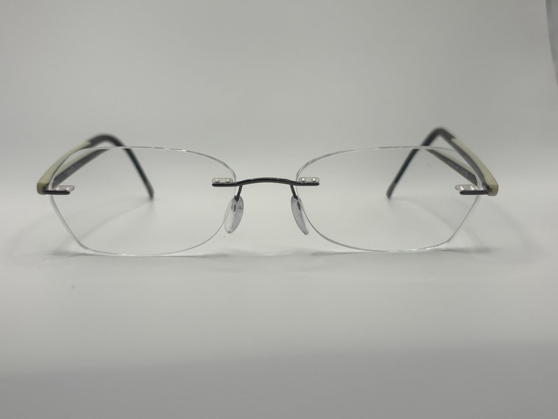 Silhouette 7642 40 6054 Rimless Black Plastic Eyeglasses Frames 40mm 17mm 135mm gallery